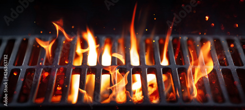 BBQ Grill With Bright Flames And Glowing Coals