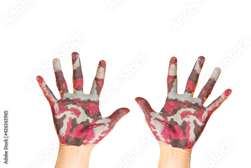 human hands in colorful paint