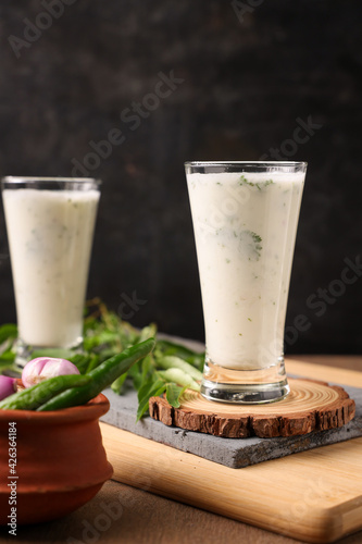 Obraz na plátně Spiced buttermilk , chaas , chaach , moru , sambharam , curd, lassi , yogurt, cool refreshing drink for hot summer in glass , Kerala, India