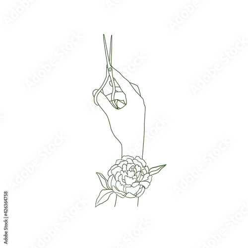 The outline of a pair of scissors in the hairdressers hand and a flower. The barber holds the tool. Sketch, doodle, green line on white background. Hair salon symbol, icon.