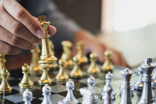 Businessman moving chess.ideas concept Plan leading strategy of successful competition.