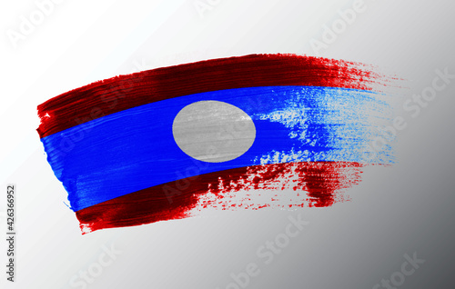 Laos flag illustrated on paint brush stroke
