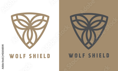 Luxury wolf shield logo template. symmetrical abstract logotype. design in brown and gray. vector