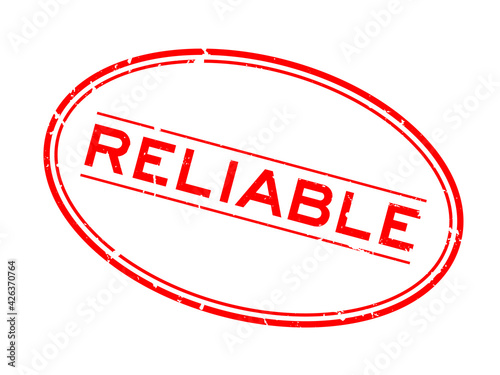 Grunge red reliable word oval rubber seal stamp on white background