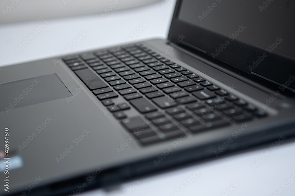 closeup of a notebook keyword. Laptob Keyboard Selective Focus