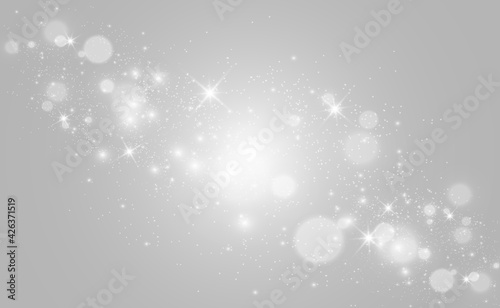 Beautiful sparks shine with special light. Vector sparkles on a transparent background. Christmas abstract pattern. A beautiful illustration for the postcard. The background for the image. Luminaries.