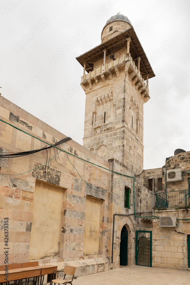 The Bab  al-Silsila minaret and the inner schoolyard of the Madrasah are on the Temple Mount in the Old Town of Jerusalem in Israel