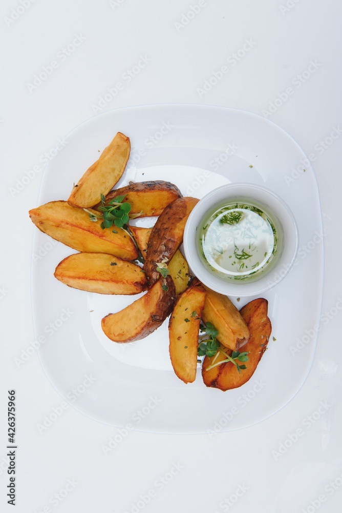 potatoes with meat and vegetables white background