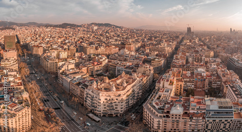 Barcelona, Spain - Feb 25, 2020: Pano aerial drone shot of barcelona city center during sunrise