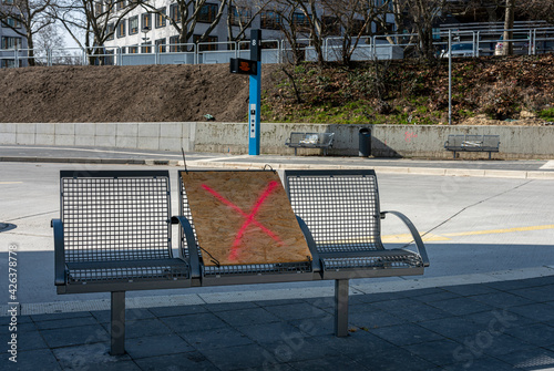 Bench with provisional wooden board for the Corona distance