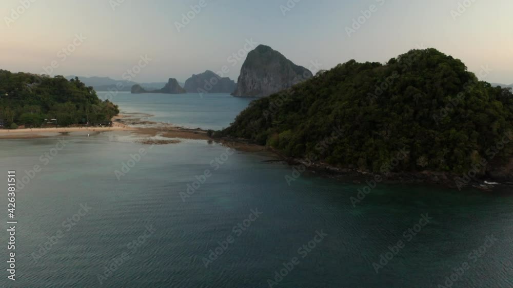 Aerial showing Depeldet Island and in the back Pinagbuyutan Island near El Nido, Palawan, Pilippines. Aerial showing Depeldet Island and in the back Pinagbuyutan Island near El Nido, Palawan, Pilippines.