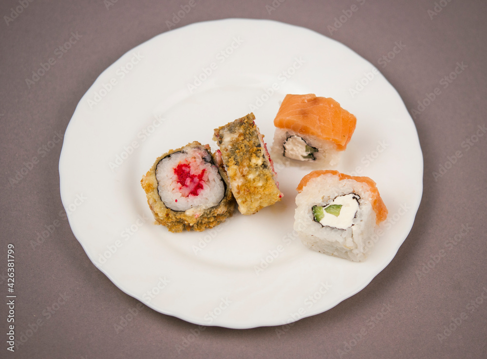 Sushi roll with salmon and shrimp tempura