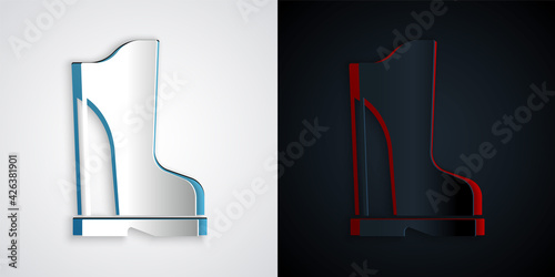 Paper cut Waterproof rubber boot icon isolated on grey and black background. Gumboots for rainy weather, fishing, gardening. Paper art style. Vector