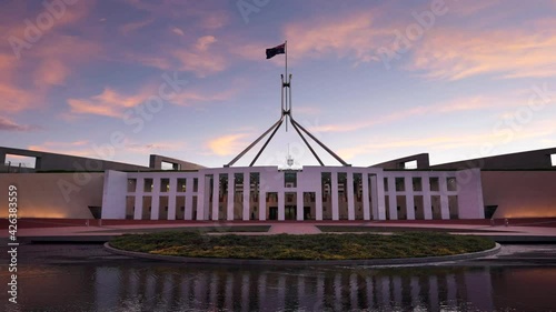 a sunset view of federal parliament house at canberra in the act, australia