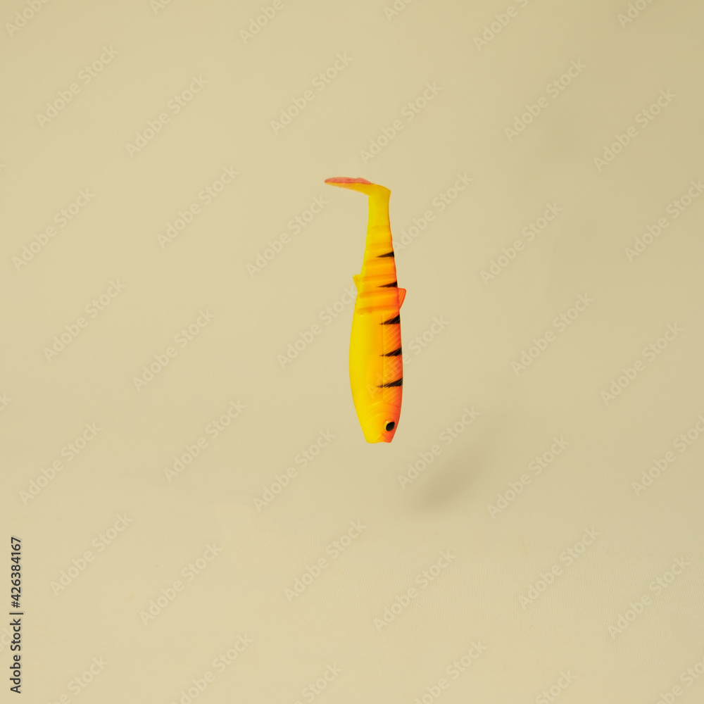 fish bait on a yellow background for fishing