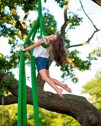 aerial gymnast on the great oak