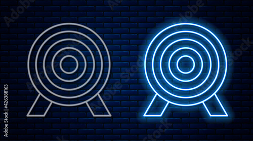 Glowing neon line Target financial goal concept icon isolated on brick wall background. Symbolic goals achievement, success. Vector