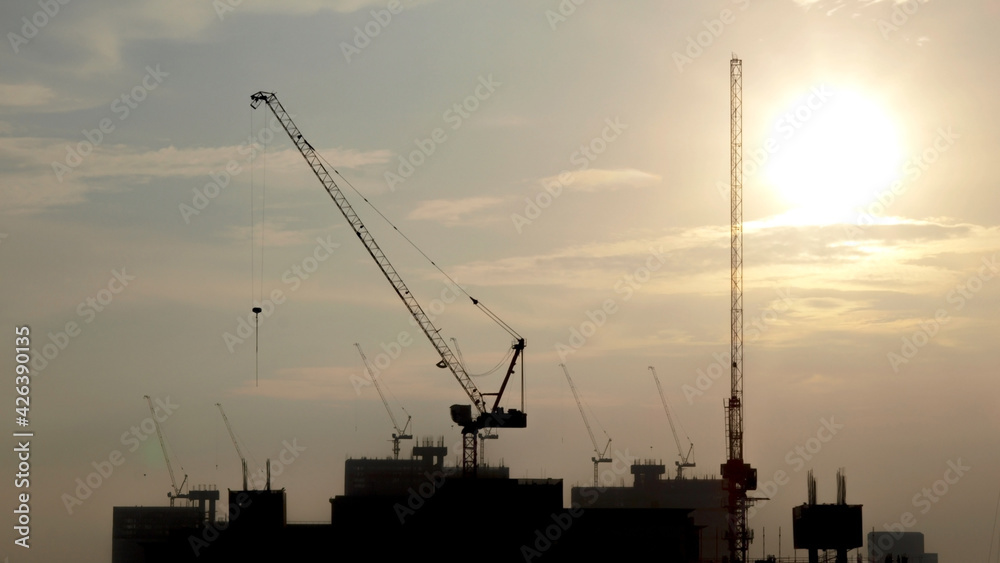 Construction site in Bangkok Thailand with the sun set.