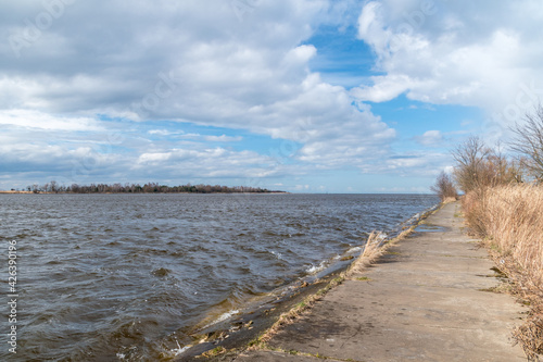 Path to estuary Vistula River to the Baltic Sea at windy day.