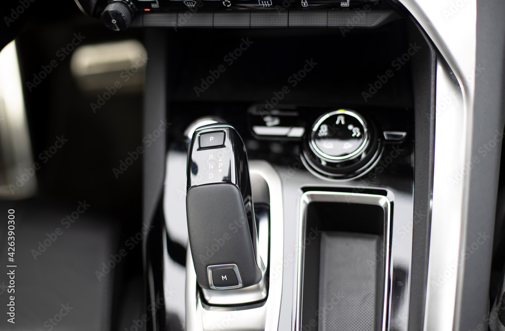 close-up of an automatic transmission knob in a new modern car. top view