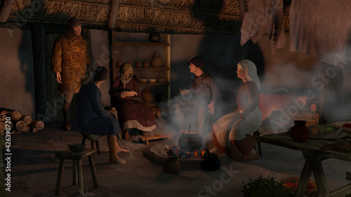Foto Family gathered around fire inside medieval farm