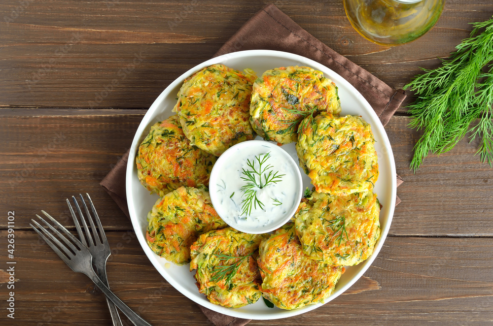 Fotografie Diet vegetable cutlet from zucchini, carrot, herbs