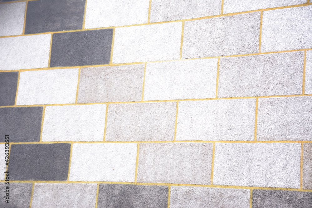 a patterned concrete wall texture, use it as a background or wallpaper a patterned concrete wall texture, use it as a background or wallpaper