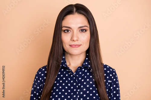 Photo of gorgeous person serious face look camera wear vintage outfit isolated on beige color background © deagreez