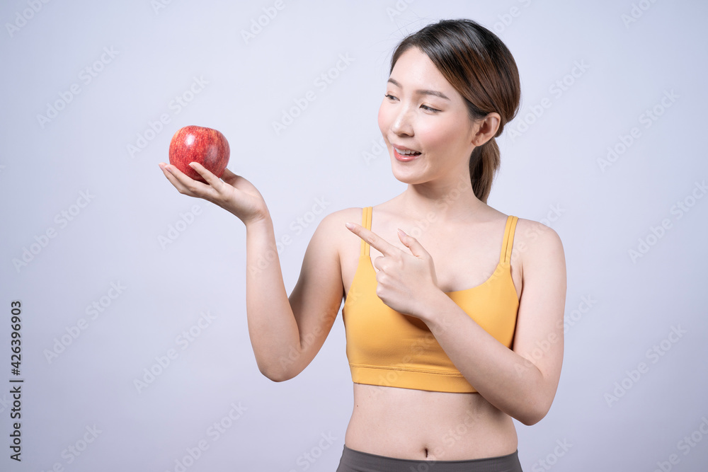 Asian women in yellow sportswear, Isolated on white background, Concept of health care and exercise. Asian women in yellow sportswear, Isolated on white background, Concept of health care and exercise.