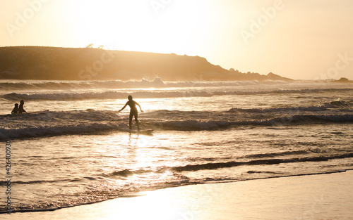 surfing sunset