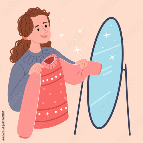 The girl tries on a cozy sweater.Choosing clothes from the wardrobe trying on a sweater, looking thoughtfully in the mirror. Sale concept.Modern vector illustration in flat cartoon style.