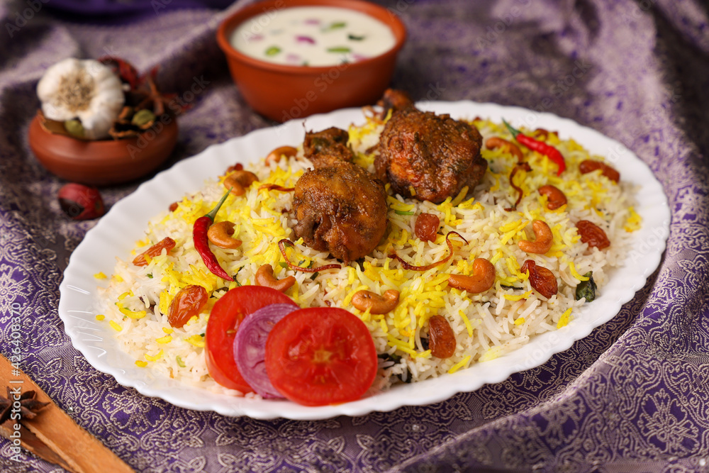 Chicken biryani Spicy Indian Malabar biryani Hyderabadi biryani, Dum Biriyani pulao golden bowl Kerala India Sri Lanka Pakistan basmati rice mixed rice dish with meat curry Ramadan Kareem, Eid Chicken biryani Spicy Indian Malabar biryani Hyderabadi biryani, Dum Biriyani pulao golden bowl Kerala India Sri Lanka Pakistan basmati rice mixed rice dish with meat curry Ramadan Kareem, Eid