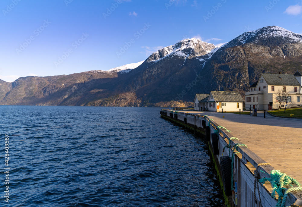 Eidfjord, a Norwegian town and municipality in the Hordaland region, view from the beach on the Eidfjorden,  the inner branch of the large Hardangerfjorden in Scandinavia