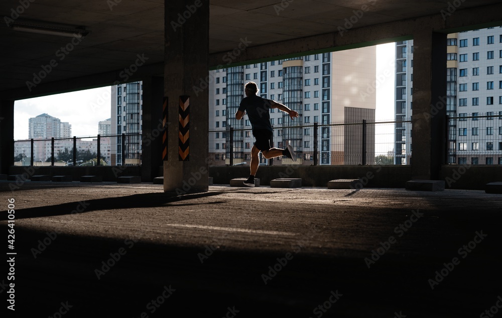 Fitness, workout, sport, lifestyle concept. Middle-aged man running in the city Fitness, workout, sport, lifestyle concept. Middle-aged man running in the city