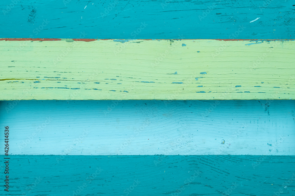 Blue and green painted wooden wall Blue and green painted wooden wall