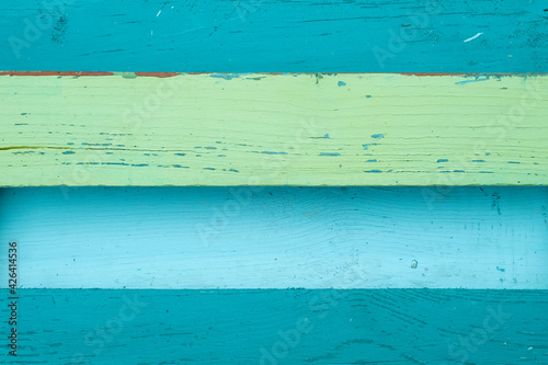 Blue and green painted wooden wall