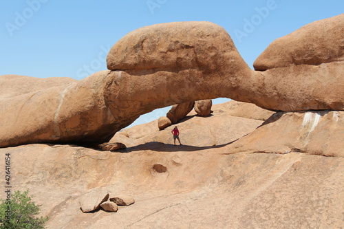 a hole in a mountain near spitzkoppe in namibia