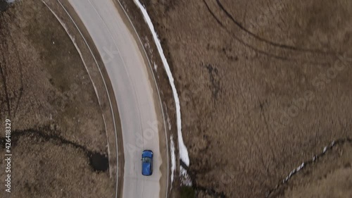 chasing a blue car with drone