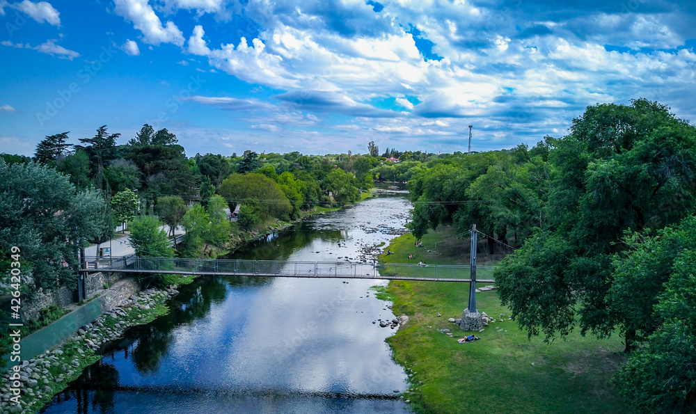 Ciudad de Santa Rosa de Calamuchita, ubicada en la zona serrana de la Provincia de Córdoba Argentina. Foto Aérea tomada con drone de la ciudad al costado de las montañas en un día tormentoso. Ciudad de Santa Rosa de Calamuchita, ubicada en la zona serrana de la Provincia de Córdoba Argentina. Foto Aérea tomada con drone de la ciudad al costado de las montañas en un día tormentoso.