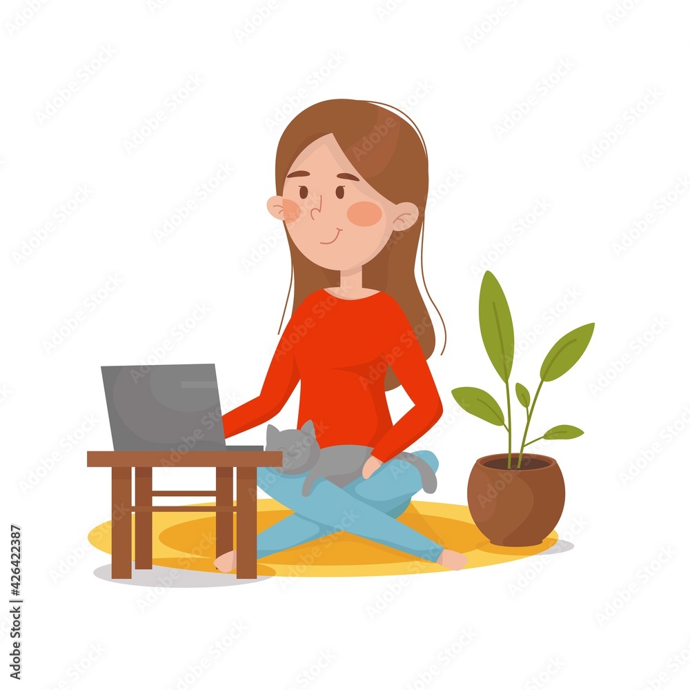 The girl works at the computer at home. Telework. Vector illustration.