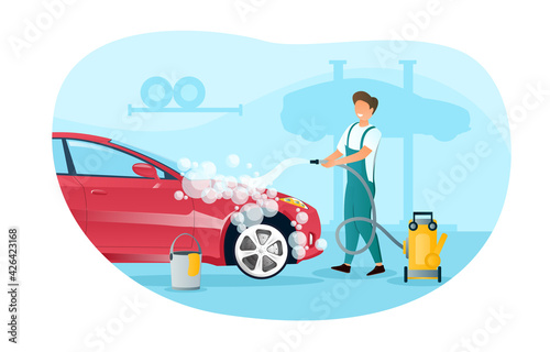 Male character in overall is washing a car in garage