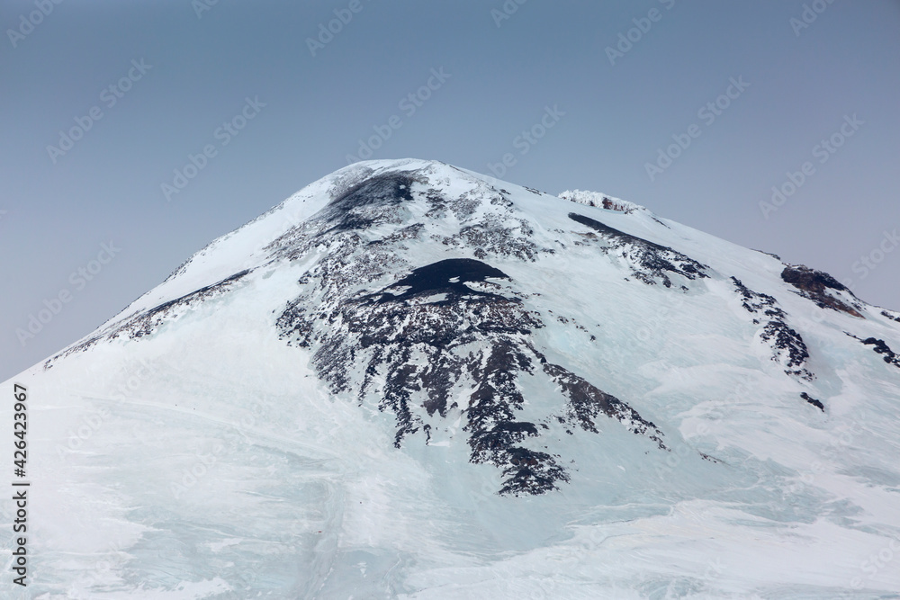 Snowy mountain peaks. North Caucasus, Kabardino-Balkaria, Elbrus, Russia. Snowy mountain peaks. North Caucasus, Kabardino-Balkaria, Elbrus, Russia.