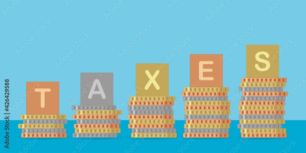 Piles of coins with “taxes” text on them, taxes concept