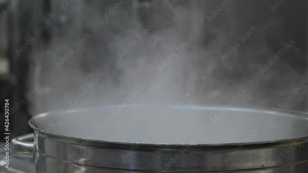 Huge Metal Pot With Boiling Water Steam Coming Up Close Up
