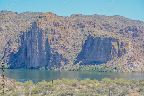 Beautiful desert rock formations line this secluded  Canyon Lake in Tortilla Flat  Tonto National Forest  Arizona