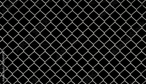 Foto Grid pattern of chain link mesh fence on black background
