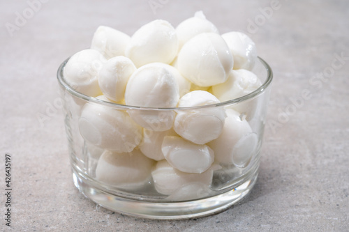 Cheese collection, small balls of fresh white soft Italian mozzarella cheese, ready for making caprese salad