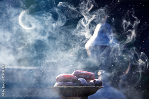 Ramadan kareem background with Quaran, censer and dates. photo