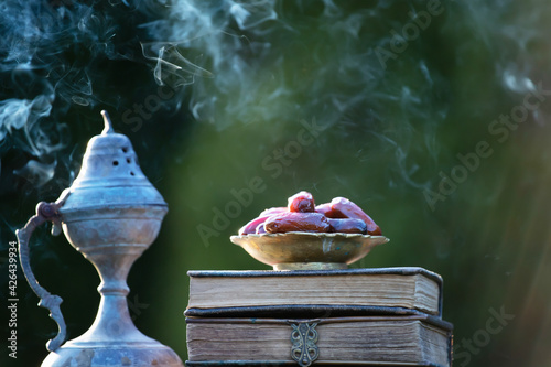 Ramadan kareem background with Quaran, censer and dates. photo