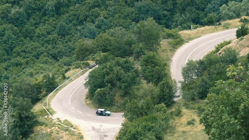 Kocani, Macedonia - 24 Jun, 2018: Custom sport car driving fast on hill climb race on winding mountain road photo